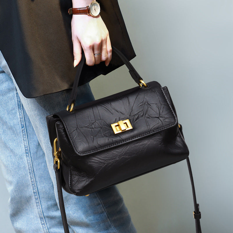 Women’s Minimalist Leather Lock Clasp Crossbody Top Handle Bag image 4