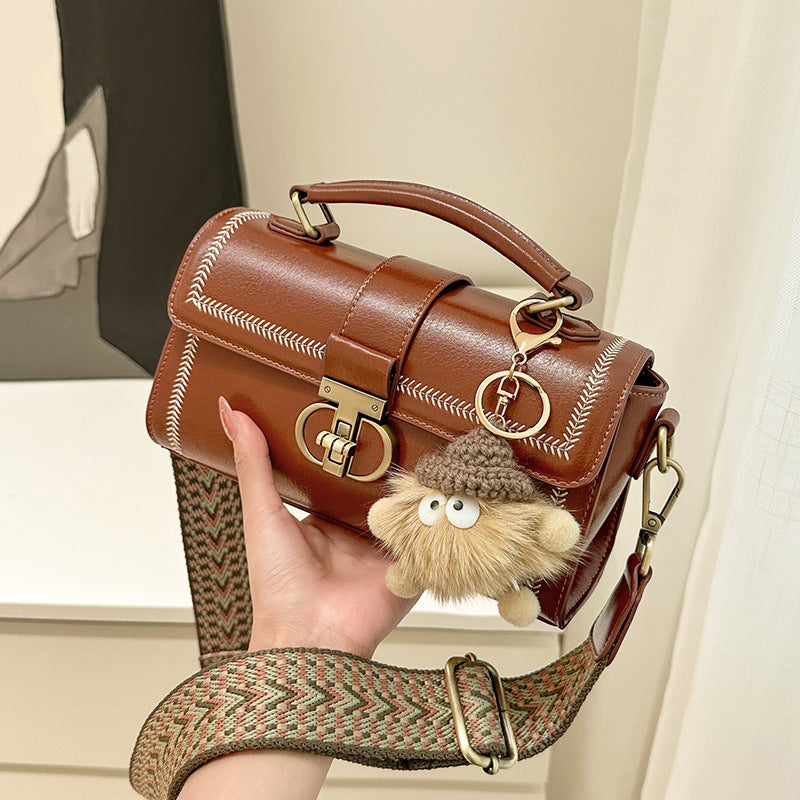 Women’s Vintage Genuine Leather Crossbody Top Handle Bag with Lock Closure image 3