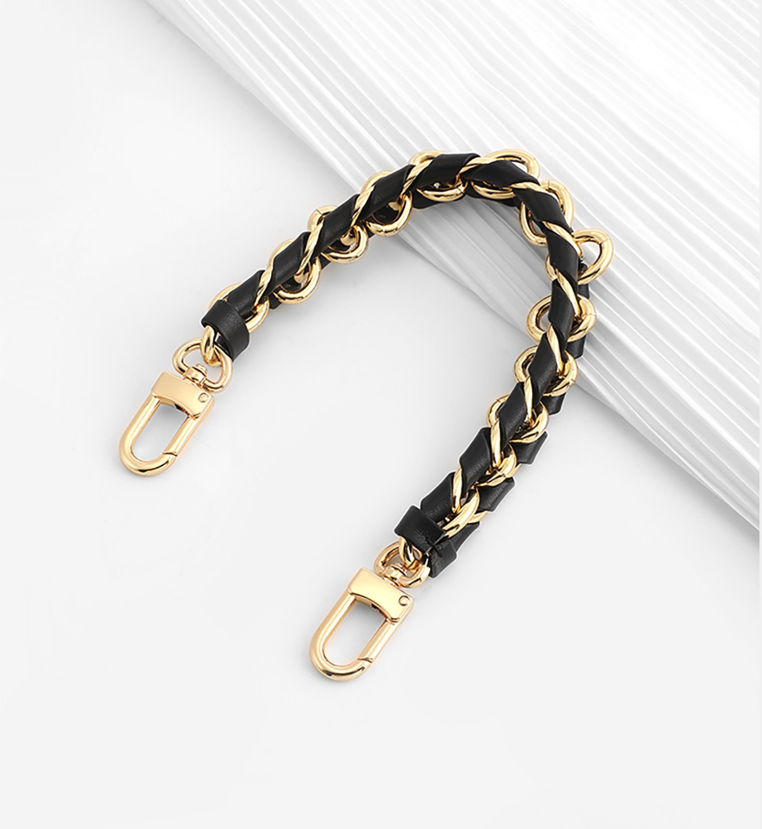 The NéoNoé bucket bag handbag strap, black genuine leather material underarm shoulder strap, and metal material fashionable underarm shoulder strap.