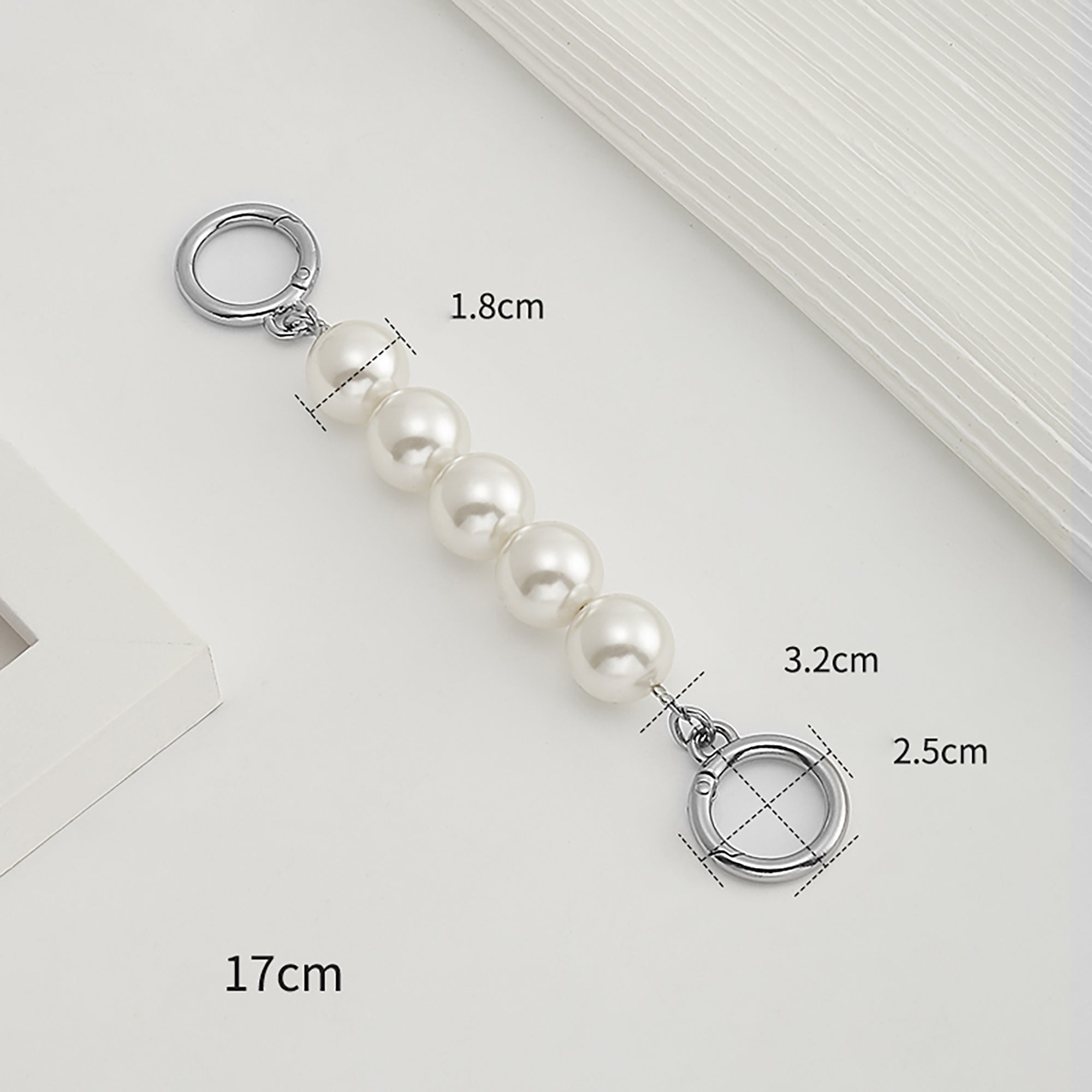 Underarm bag strap extension accessory, pearl extension chain, metal chain strap modification for bags.